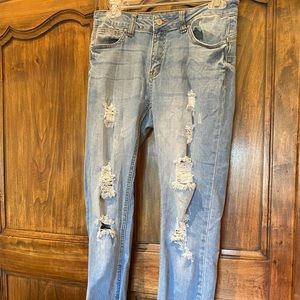 Distressed denim jeans